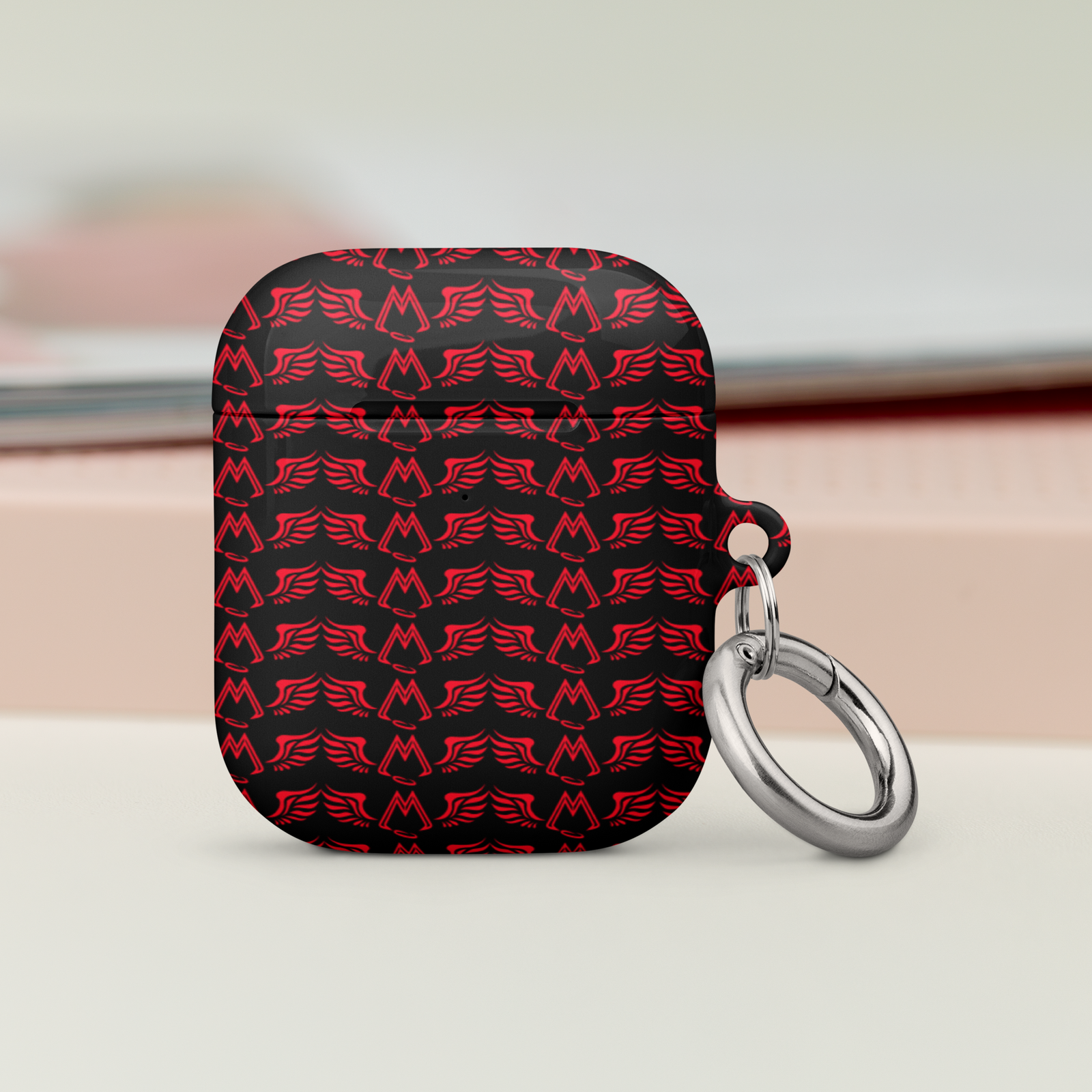 Black AirPods Cases With Duplicated Red MM Iconic Logo
