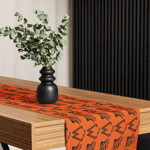 Orange Table Runner With Duplicated Black MM Iconic Logo
